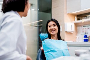 Female Patient Smiling in Dental Chair